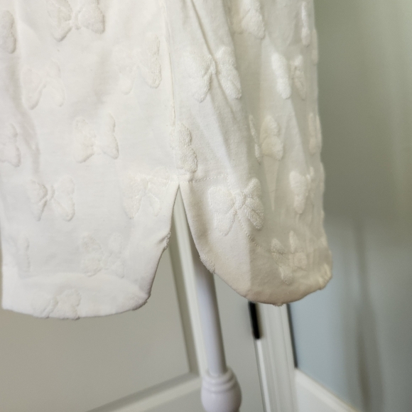 NWT Disney Ivory Mini Skirt with Bow Motif For Minnie Mouse - Picture 8 of 9